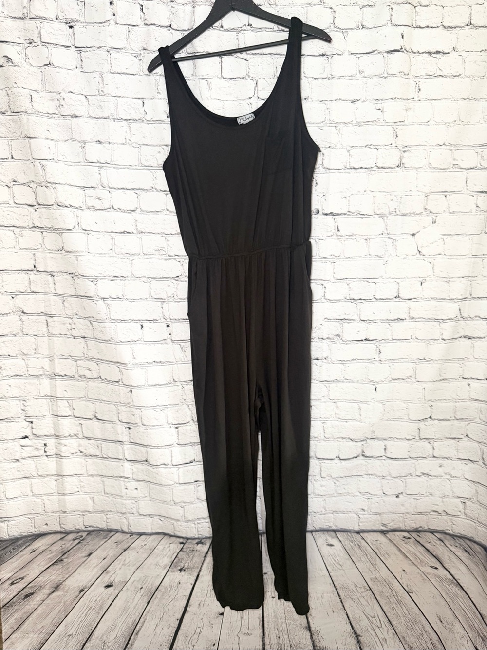 J for Justify. Black jumper. Size XL